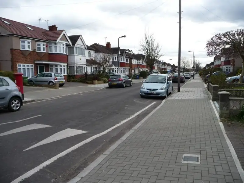 Dropped kerbs along Torbay Road in Eastcote, where front gardens are used for parking. Not a Hull street.